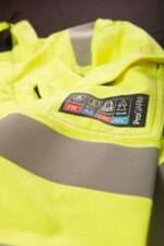 Progarm 6458 Linesman Arc Hi Vis Coverall is a premium quality coverall in VXS+ super soft 240gsm Flame Resistant fabric designed specifically for workers in the Utility and Energy markets requiring a lighter weight fabric and a garment that can be worn in conjunction with a body harness.