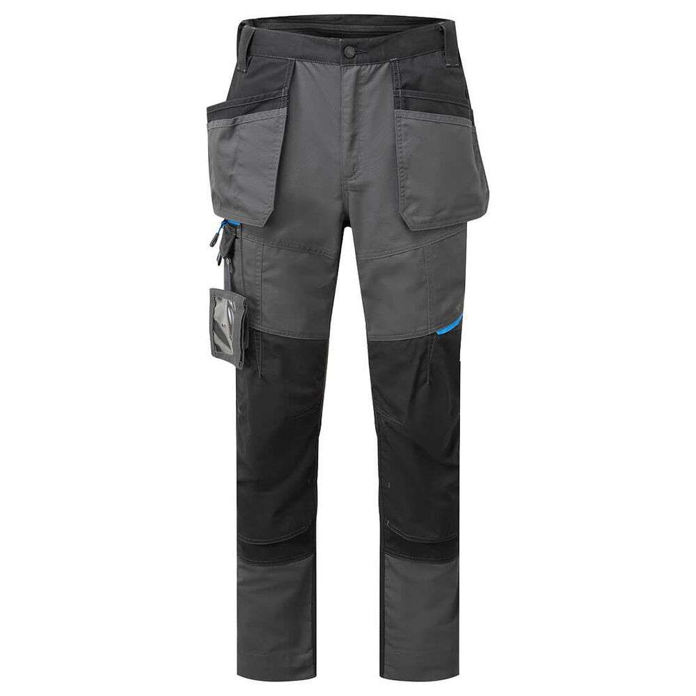 WX3 Slim Fit Holster Trousers. A slim fit version of the T702 these contemporary work trouser feature clever holster pockets for ample storage and security. Made from durable poly-cotton canvas fabric and includes triple stitched seams, these trousers have a multitude of practical features including two-tier knee pad pockets, a high rise back waistband and an adjustable leg hem for added convenience. Innovative stretch panelling provides excellent comfort and flexibility in key movement areas.